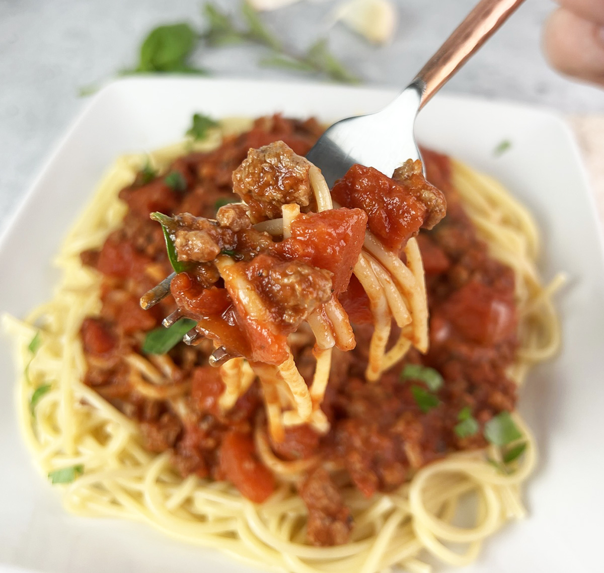 A fork full of low sodium spaghetti sauce