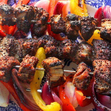 Delicious low sodium pork tenderloin skewers with grilled veggies and blueberry salsa