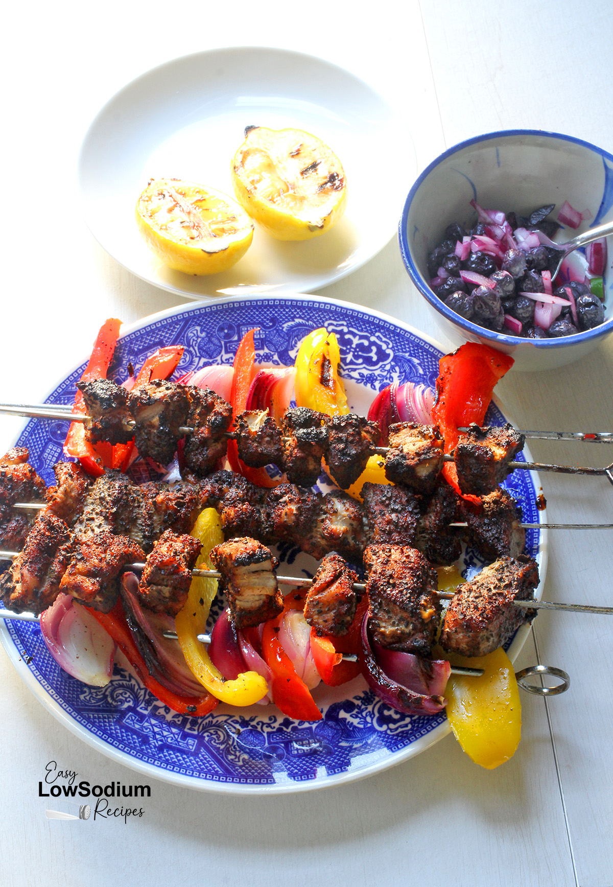 Recipe for coffee crusted pork tenderloin skewers with blueberry salsa