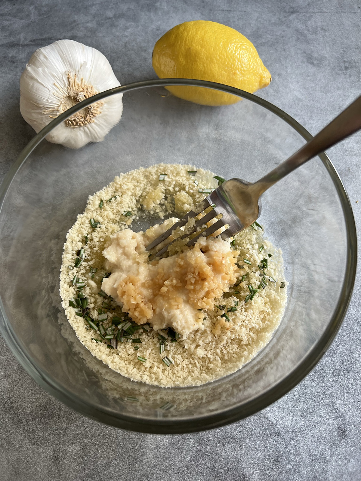 Mixing horseradish crust ingredients for low sodium pork tenderloin recipe.