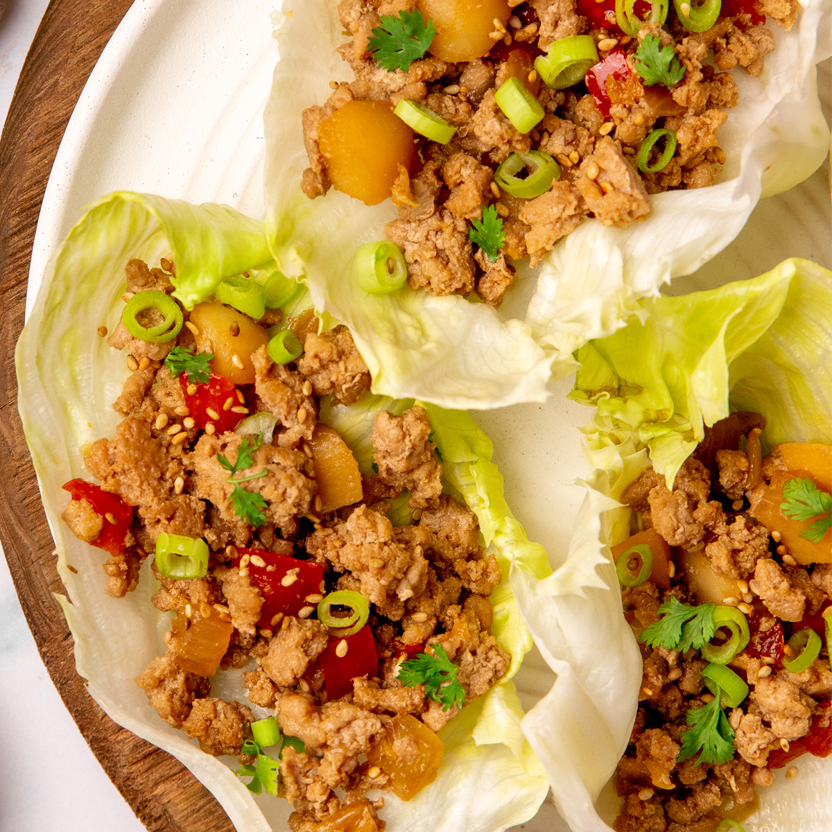 Low sodium Asian turkey lettuce wraps served on a plate.