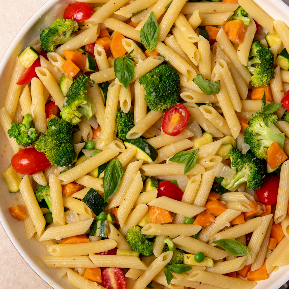 Close-up of low-sodium pasta primavera in a skillet.