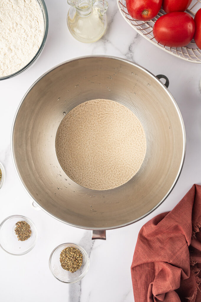 Making the dough for Margherita pizza recipe.