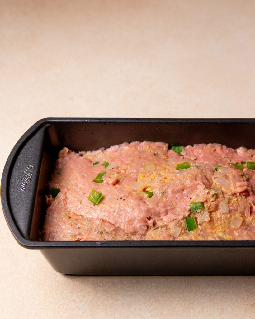 Low-sodium turkey meatloaf in a loaf pan before going in the oven.